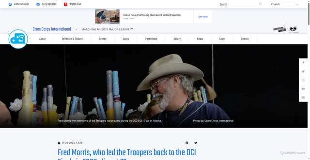 Security scan screenshot of https://www.dci.org/news/fred-morris-who-led-the-troopers-back-to-the-dci-finals-in-2009-dies-at-73/