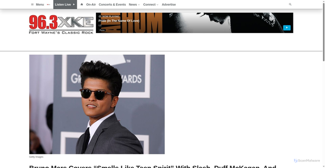 Security scan screenshot of https://963xke.com/2025/12/14/bruno-mars-covers-smells-like-teen-spirit-with-slash-duff-mckagan-and-chad-smith-at-private-show-featuring-eddie-vedder-brandi-carlile-and-yungblud/